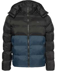 Calvin Klein - Jassen ,Zwart ,Nylon Gewatteerd Pufferjack Met Capuchon - Lyst