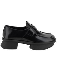 Prada - Sole Flat Shoes With Glossy Finish And Moder - Lyst