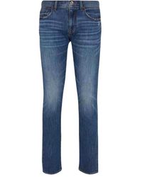 Armani Exchange - Jeans slim fit blu con cuciture a contrasto - Lyst