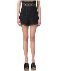 Charo Ruiz - Schwarze Spitzen-Shorts Mit Wellensaum - Lyst