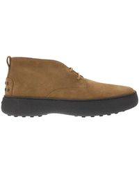 Tod's - Suede ankle boots mit vintage-effekt - Lyst