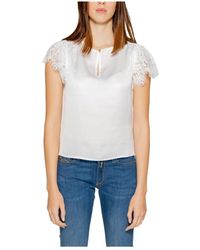 Guess - Blusa mujer manga corta colección - Lyst
