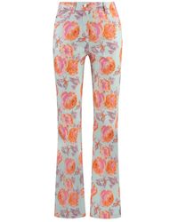 St. John - Pantalon Évasé À Fleurs Imprimées - Lyst