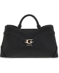 Guess - Handbags - Lyst