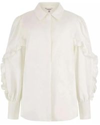 Guess - Blusa bianca in cotone per donna - Lyst