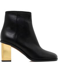 Chloé - Schwarze Leder-Stiefeletten Mit Goldenen Absätzen - Lyst