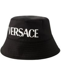 Versace - Cappello nero in nylon - design elegante - Lyst