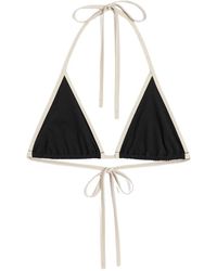 Totême - Top bikini nero con bordo a righe - Lyst