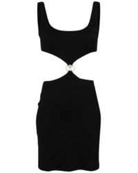 Moschino - Vestido negro con detalles metálicos cut out - Lyst
