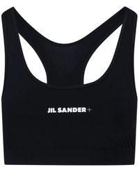 Jil Sander - Top sportivo nero con logo - Lyst
