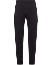 C.P. Company - Schwarze Hose Mit Elastischem Bund Und Cp-Linsendetail - Lyst