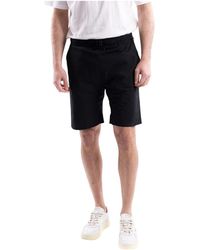 Saucony - Korte Broeken ,Zwart ,Katoen Bermuda Shorts - Lyst
