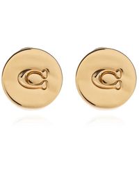 COACH - Orecchini in ottone - Lyst