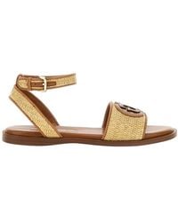 Guess - Flat Sandals - Lyst