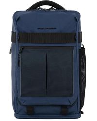 Piquadro - Blauer bucket bag & rucksack mit led - Lyst
