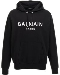 Balmain - Paris Witte Klassieke Logo Zwarte Hoodie - Lyst