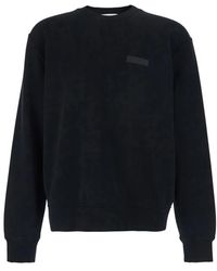 Givenchy - Hoodies & Sweatvesten ,Zwart ,Katoen Zwart Sweatshirt Met Ronde Hals En Logopatch Op De Voorkant Van Katoen Voor - Lyst