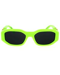 Versace - Sonnenbrille mit unregelmäßiger form in fluoreszierendem grün und dunkelgrau - Lyst