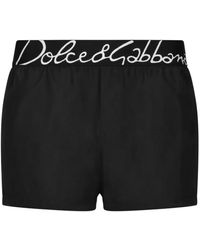 Dolce & Gabbana - Abbigliamento mare nero con logo - Lyst