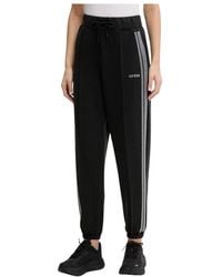 Guess - Broeken ,Zwart ,Polyester Berthe Trainingsbroeken - Lyst