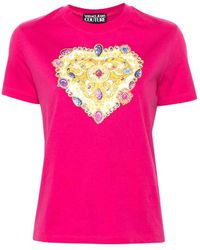 Versace - T-shirt in cotone fucsia con logo cuore - Lyst