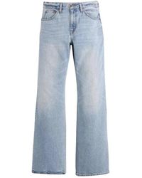 Levi's - Flared Jeans - Lyst