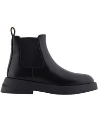 ARMANI EXCHANGE - Schoenen ,Zwart ,Leer Zwarte Leren Logo Laarzen Ronde Neus - Lyst