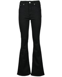 Calvin Klein - Flared Jeans - Lyst