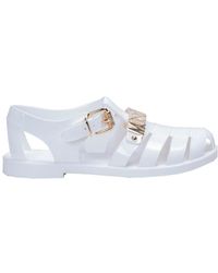 Moschino - Flat Sandals - Lyst
