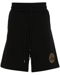 Versace - Schwarze baumwollfleece shorts - Lyst