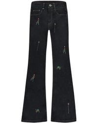 flâneur - Jeans ,Blauw ,Denim Geborduurde Relikwieën Raw Denim Flared Jeans - Lyst
