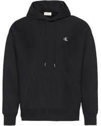 Calvin Klein - Hoodies & Sweatvesten ,Zwart ,Katoen Minimalistisch Logo Hoodie Premium Terry - Lyst
