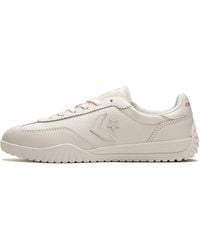 Converse - Schoenen ,Wit ,Leer Witte Retro Stijl Trainer Met Gouden Accenten - Lyst