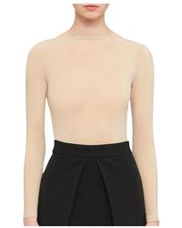 Wolford - Top a maniche lunghe buenos aires senza cuciture - Lyst