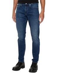 Calvin Klein - Blaue Baumwoll Slim Taper Jeans - Lyst