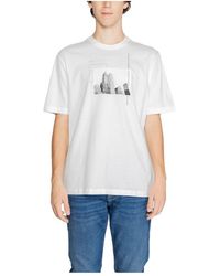 ARMANI EXCHANGE - Baumwoll-t-shirt mit print - Lyst
