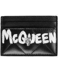 McQueen - Billetera de cuero acolchada con adornos de calavera - Lyst