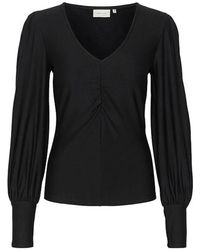 Gestuz - Blusa negra con cuello en v y mangas abullonadas - Lyst