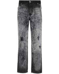 Balmain - Jeans in denim délavé - Lyst