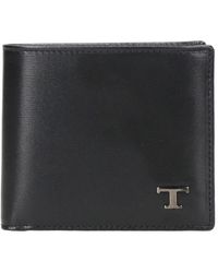 Tod's - Schwarze lederbrieftasche mit metall-logo - Lyst