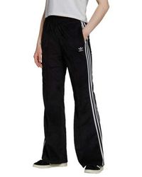 Pantalones de pernera ancha y palazzo adidas Originals de mujer: hasta el  51 % de descuento | Lyst
