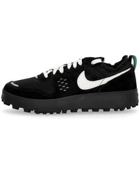 Nike - Fitness ,Zwart ,City Zwarte Sneakers Met Groene Accenten - Lyst
