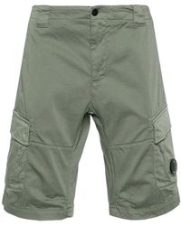 C.P. Company - Grüne cargo shorts mit lens detail,schwarze logo-shorts - Lyst