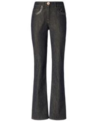 Genny - Jeans > Flared Jeans - Lyst