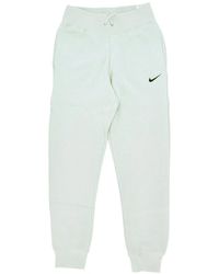 Nike - Pantalon De Survetement Polaire Femme Vetement De Sport Jogging Polaire Taille Haute Argent Clair/Noir - Lyst