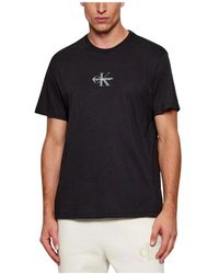 Calvin Klein - Tops ,Zwart ,Katoen T-Shirt Van Katoen Met Ronde Hals En Korte Mouwen - Lyst