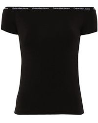 Calvin Klein - Top negro para conjuntos elegantes - Lyst