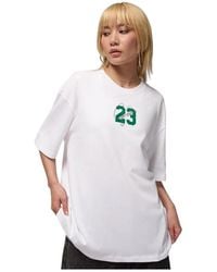 Nike - Fitness ,Wit ,Katoen Essentials T-Shirt Met Korte Mouwen En Graphic - Lyst