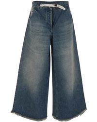 Moncler - Jeans con flecos - Lyst