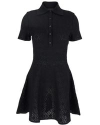 Givenchy - Schwarzes kleid im polo-shirt-stil mit logo - Lyst